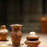 Ancient Japanese pottery artifacts displayed in a museum