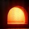 Interior glow of a pottery kiln during firing